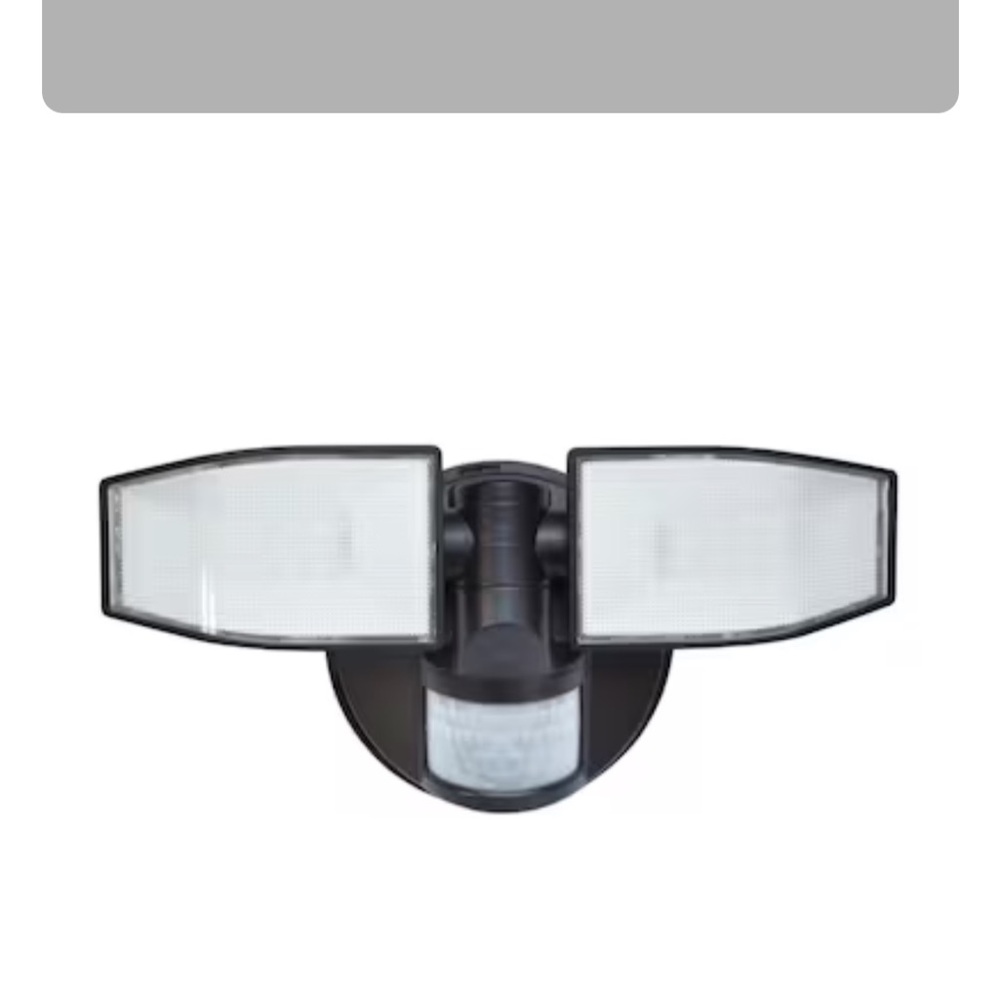 NWOT GOOD EARTH LIGHTING Dual Head Black Motion Sensor Security Light Never used